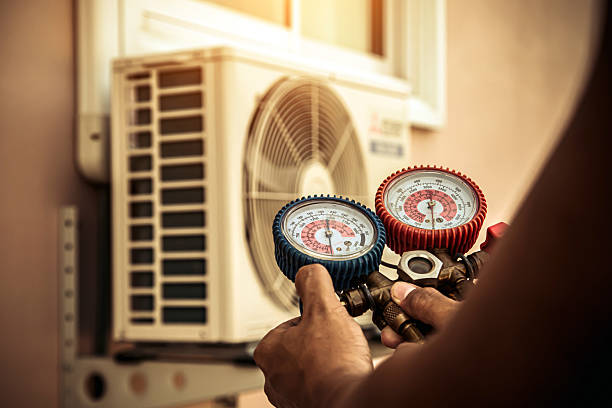 Professional Furnace Repair technician working in Audubon, IA
